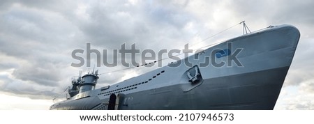 German submarine U-995. Dramatic sky, storm clouds. Museum ship, Laboe Naval Memorial. Germany. Panoramic view. Travel destinations, landmarks, sightseeing, history, past, war, WW2, nautical vessel