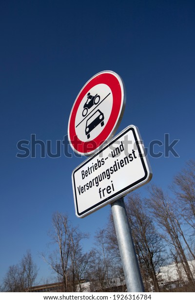 german traffic sign, no cars and bikes allowed,\
except cars for supply\
service