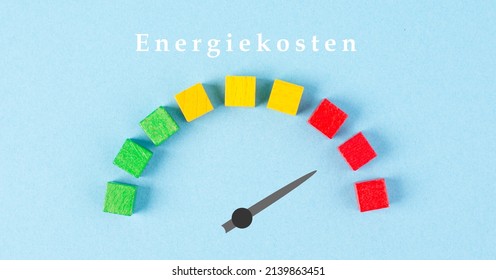 The german word for energy costs is standung over the tachometer, high increase in the price, poiter is in the red area, social and political issue
