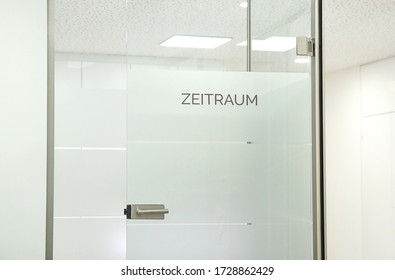 German Word ' Zeitraum' Engl. 'Waiting Room' Text Sign On Glass Door In A Doctor's Office, Doctor Room