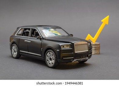 Germany 04.2021. Car Insurance. Car Insurance Price, Insurance Cost. Rising Car Prices. Yellow Arrow Pointing Upwards.Editorial