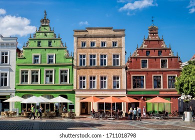 Güstrow, Germany - 07.06.2019 - old gabled houses on the market square in the old town