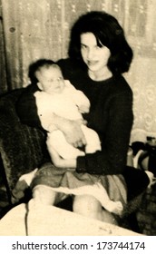 GERMANY - 1960s: An antique photo shows woman holding a small child