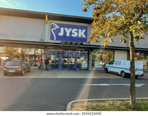 Mörfelden-Walldorf, Germany - 22nd September 2021: A
german photographer observes the change of the name of the store
called Dänisches Bettenlager into JYSK, the new Name from October
2021 on.
