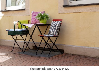 Osnabrück, Germany - 4 May 2020: Trendy Patio Furniture For Sale Within Shopping Streets In A German Town