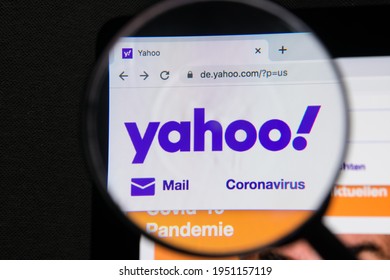 Germany - April 7,2021: Yahoo website under a magnifying glass. Yahoo is a multinational Internet corporation globally known for its Web portal, Yahoo Search.