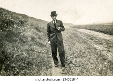 GERMANY, CIRCA 1920s: Vintage Photo Of Man In Hat Outdoor