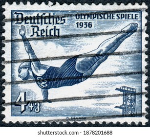 GERMANY - CIRCA 1936: Postage Stamp Printed In Germany, Dedicated To The Summer Olympic Games In Berlin, Shown A High Diver, Circa 1936