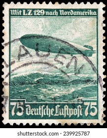 GERMANY - CIRCA 1936: A Stamp Printed By GERMANY Shows  A Large German Commercial Passenger-carrying Rigid Airship LZ 129 Hindenburg (Luftschiff Zeppelin), Circa 1936