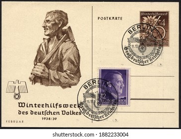 GERMANY - CIRCA 1938: Postacard Printed In Germany, Issue Winter Relief, Shown A Worker With A Sledgehammer, Circa 1938