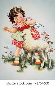 GERMANY - CIRCA 1952: Postcard printed in GDR shows Girl playing with the lamb, circa 1952