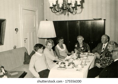 GERMANY -  CIRCA 1960s: An Antique Photo Shows Family Party