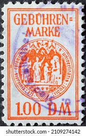Germany - Circa 1970 A postage stamp from Germany showing the coat of arms of the University of Cologne on an administration fee stamp 