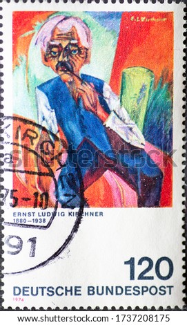 GERMANY - CIRCA 1974: a postage stamp printed in Germany showing an old farmer. Text: Ernst Ludwig Kirchner