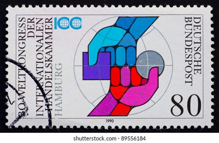 GERMANY - CIRCA 1990: A Stamp Printed In The Germany Shows Two Arms, International Chamber Of Commerce, 30th Universal Congress, Circa 1990