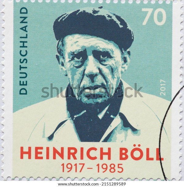 GERMANY - CIRCA 2017: a postage stamp from GERMANY,
showing a portrait of the most important German writer and Nobel
Prize winner  Heinrich Böll on the occasion of his 100th birthday.
Circa 2017