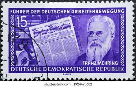 GERMANY, DDR - CIRCA 1955  : A Postage Stamp From Germany, GDR Showing A Portrait Of The Writer And Politician Franz Mehring, Front Page Of The Leipzig  Newspaper  