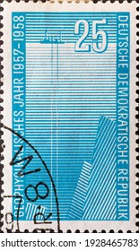 GERMANY, DDR - CIRCA 1958 : A Postage Stamp From Germany, GDR Showing A Research Ship With An Echo Sounder. Deep Sea Research. International Geophysical Year 