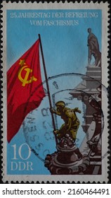 GERMANY, DDR - CIRCA 1970: A Postage Stamp From GERMANY, DDR, Showing A Red Army Soldier Raising The Soviet Flag On The Reichstag Building . Circa 1970