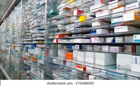 Germany Dortmund 21.4.2020
A pharmacy storage room ,Drugs are arranging and stored on a glass shelf in a pharmacy.
