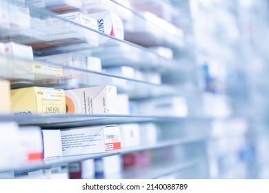 Germany Dortmund 27.3.22 A Pharmacy Storage Room ,Drugs Are Arranging And Stored On A Glass Shelf In A Pharmacy.taken Out With A Robot Hand.