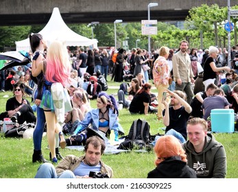 Germany, Düsseldorf, Dusseldorf, Rhine Promenade, May 21, 2022, 413 Pm, Japan Day Festival Of The Japanese People, People Store Crowds In A Meadow And Take A Break, Partly In Japanese Cosplay Clothing