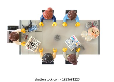 Lörrach, Germany - February 22th 2021: Lego Minifigures At Business Meeting On Table View Above. Editorial Illustrative Image Of People Are Planning In Office After Pandemy.