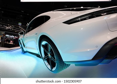 Germany, Frankfurt - 10.September 2019: Porsche Macan turbo s - electric Porsche, electric Super Sports Car - car back view - IAA Car Show Frankfurt 2019
