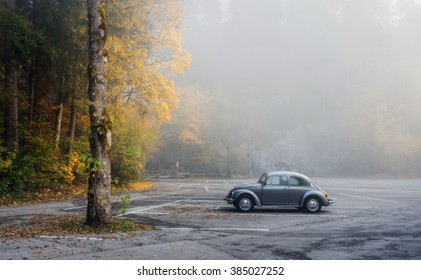 GERMANY, FUSSEN - 21 OCTOBER, 2015: Autumn Park In The Town Of Fussen And A Single Car In The Parking Lot Fussen, Germany On 21 October, 2015.