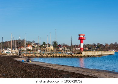 Eckernförde, Germany, January 16, 2021 - Eckernförde, even in winter, a walk on the beach on the long city beach of the tourist metropolis is worthwhile, you can enjoy the deep winter sun