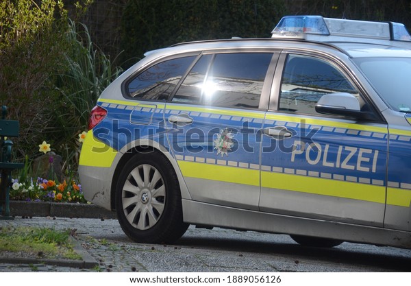Germany June 2019: A German police car in action\
is parked in a square