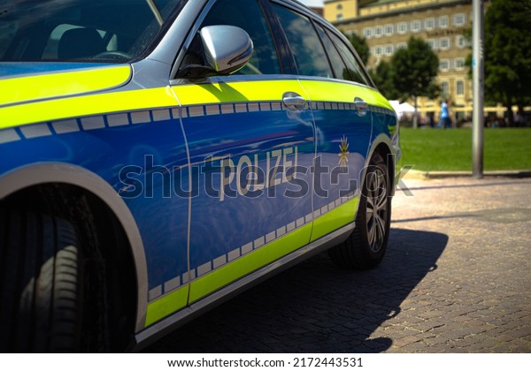 Germany - JUNE 26, 2022: A police car is parked\
at an event.\
