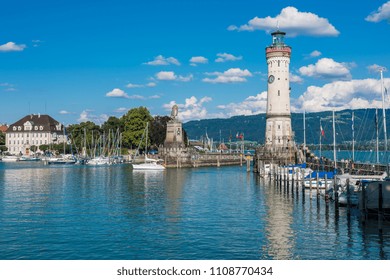 GERMANY, LINDAU - AUGUST 21: view of the lighthouse and a lion statue at the entrance to the port of Lindau at lake Constance, Bodensee on August 21, 2015