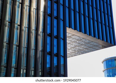 Düsseldorf, Germany - March 1. 2021: Closeup of roofing of modern building with reflection of water 