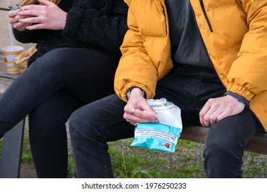 Germany - May 18,2021:Young People Making Tobacco Cigarettes. Concept Of Tobacco Use