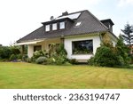 Obernwöhren, germany - September 10, 2016: Well-maintained bungalow from the 1960s