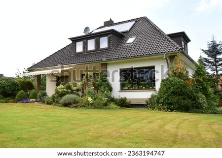 Obernwöhren, germany - September 10, 2016: Well-maintained bungalow from the 1960s