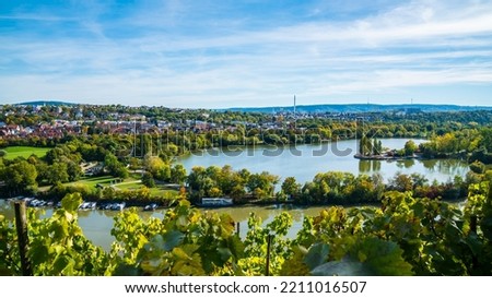 Germany, Stuttgart panorama view max eyth see lake water neckar river boats and beautiful houses in autumn, view above trees and nature landscape