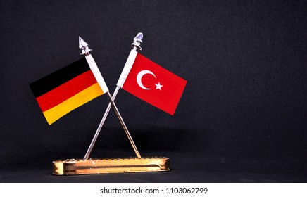 Germany And Turkey Table Flag With Black Background