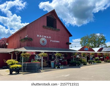 Gervais, Oregon, USA - May 10, 2022: The big red barn at Bauman's Farm and Garden market