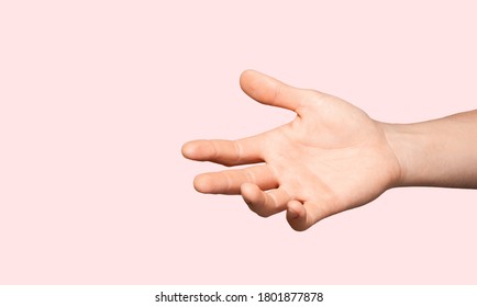 The gesture of the empty hand for holding something