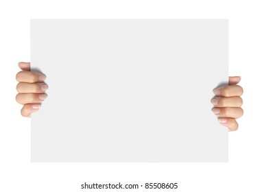gesture of hand holding a blank white paper isolated over white background - Shutterstock ID 85508605