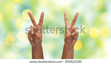 Similar – Image, Stock Photo Hand with two fingers raised on purple background and copy space