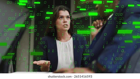 Gesturing woman in dark blazer speaking at conference table with smartphone and binary code overlay. Corporate, teamwork, innovation, digital, professional, collaboration, technology