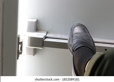 Get Away As Quickly As Possible.Use Your Feet To Kick The Fire Door.Stiff, Tight, Difficult To Open.