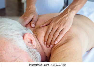 Get balanced through a massage. Senior man on massage. - Powered by Shutterstock