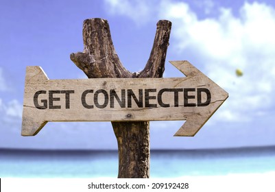 Get Connected Wooden Sign With A Beach On Background 