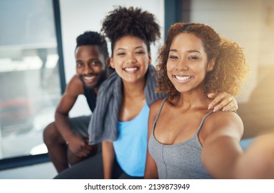 Get Excited About Getting Fit. Cropped Shot Of Three Young People Taking A Selfie After Yoga Class.