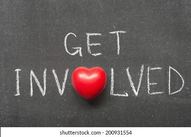 get involved phrase handwritten on school blackboard with heart symbol instead of O - Shutterstock ID 200931554
