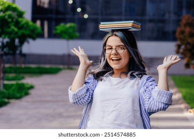 Get lost in education. Happy teen girl wearing eyeglasses holding books on head. Approval gesture. Back to school. Knowledge and education. School library. Private teaching. Read, lead and succeed. - Powered by Shutterstock